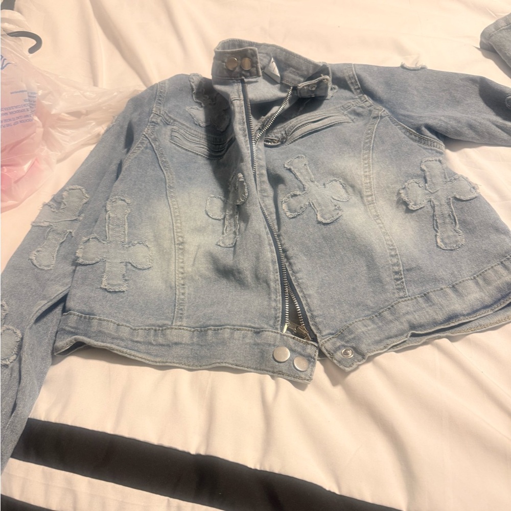 Distressed Denim Jacket with Cross Patches